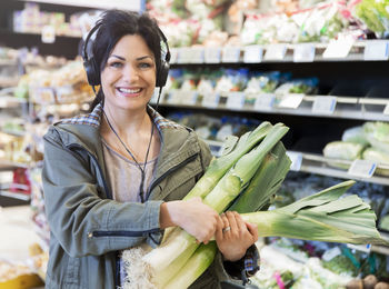 Smiling woman doing shopping