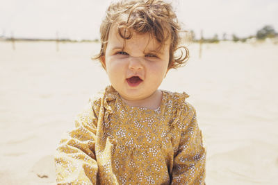 Portrait of cute boy on beach