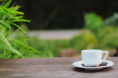 Close-up of coffee cup on table