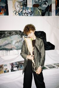 Full length of young man looking at camera
