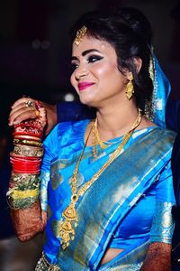 Portrait of smiling young indian lady