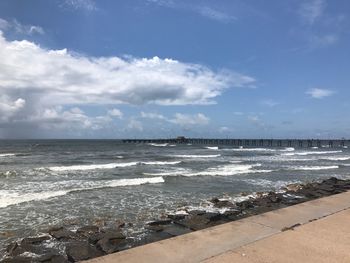 Scenic view of beach against sky