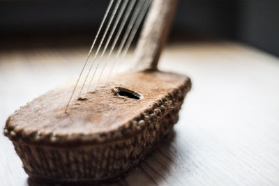 High angle view of guitar on table