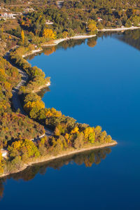 Reflection of trees on lake during autumn