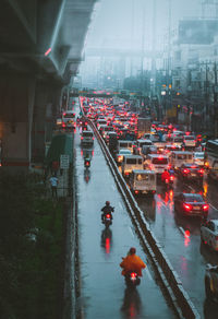 High angle view of cars on street during rainy season