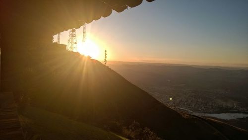 Scenic view of mountains against sky during sunset