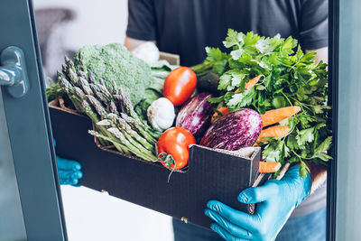 Man holding vegetables