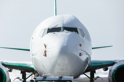Military airplane against clear sky