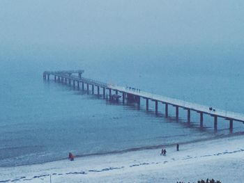 Pier on sea against sky