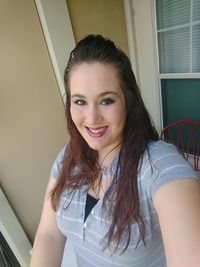 Portrait of smiling young woman