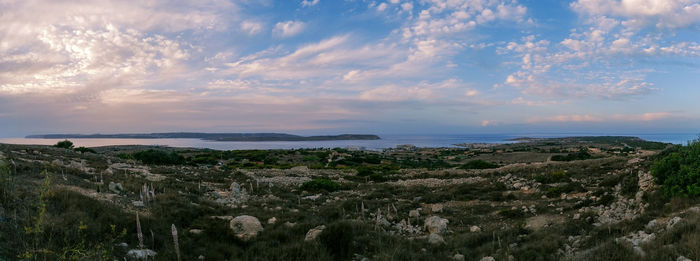 Panoramic view of sea against sky during sunset