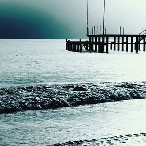 Scenic view of calm sea at sunset