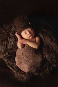 Portrait of cute girl lying on floor