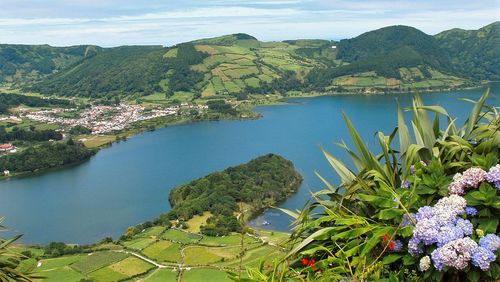 Scenic view of landscape against cloudy sky