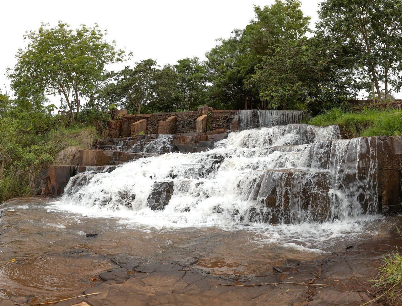 SCENIC VIEW OF WATERFALL