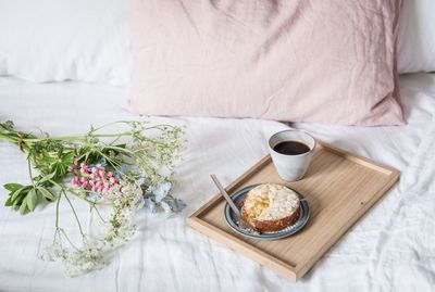 High angle view of breakfast on bed