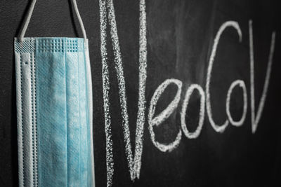 Close-up of text on blackboard