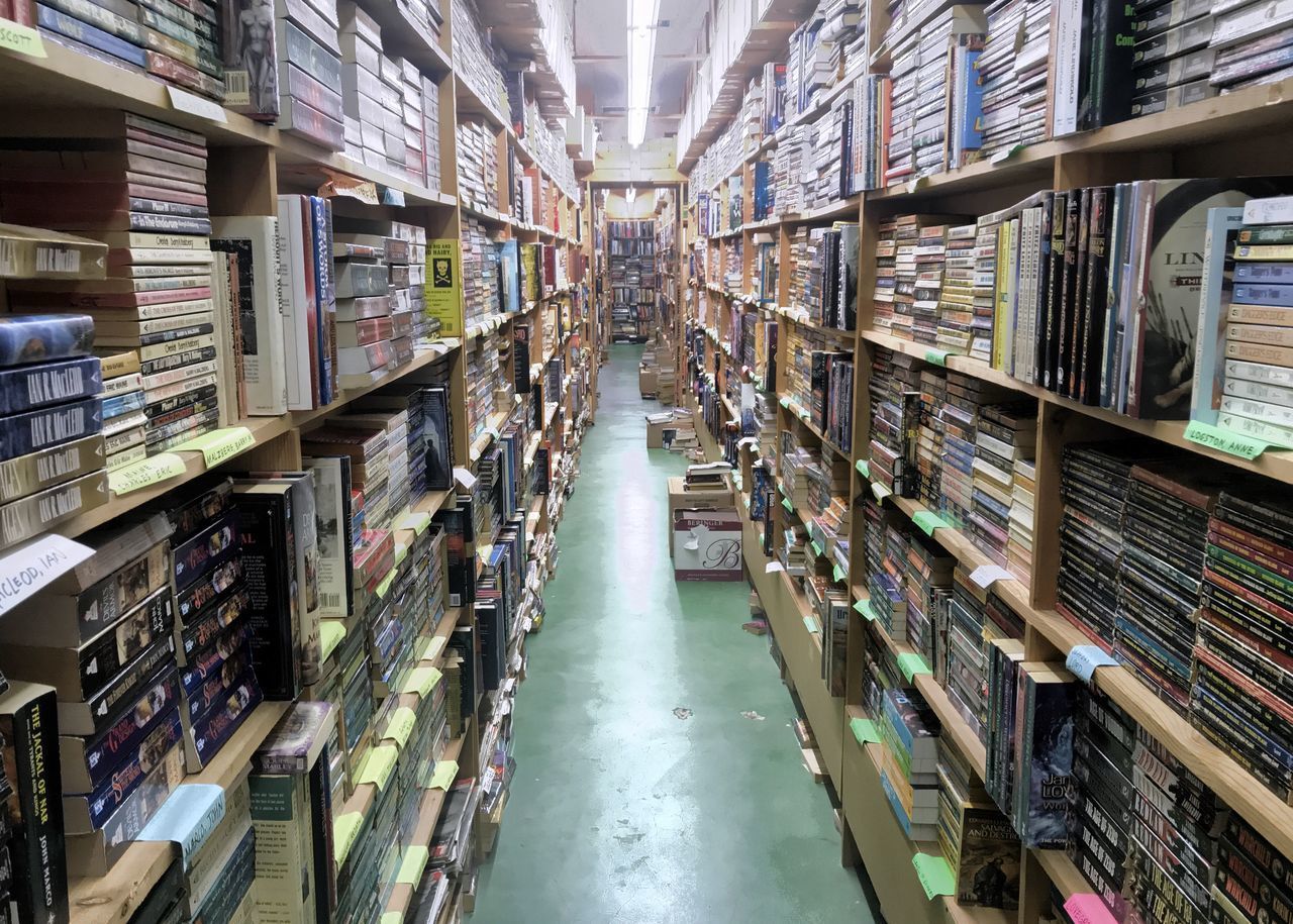 VIEW OF BOOKS IN SHELF