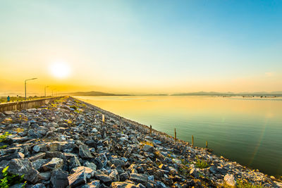 Scenic view of sea against sky during sunset