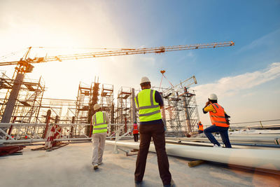 Construction workers working at site