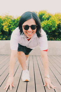 Portrait of smiling young man wearing sunglasses