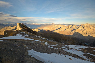 Scenic view of snowcapped mountains against sky