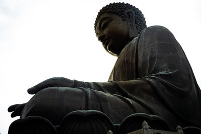 Low angle view of statue against the sky