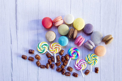 High angle view of multi colored candies on table