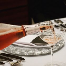 Close-up of wineglass on table