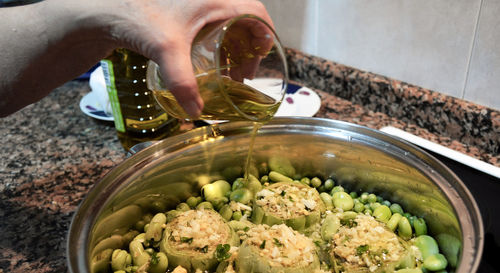 High angle view of person preparing food in bowl