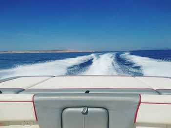 Close-up of sea against clear blue sky