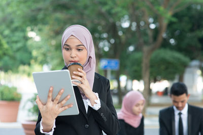 Young woman using mobile phone