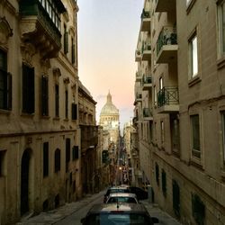 Cars moving on street in city