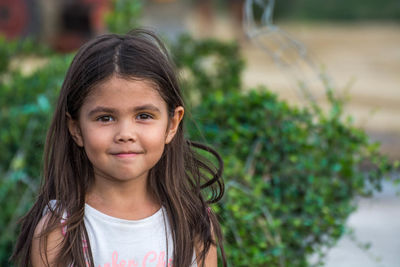 Portrait of cute girl smiling