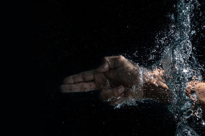 High angle view of man swimming in water