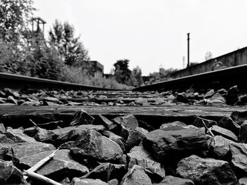 Close-up of railroad track against sky