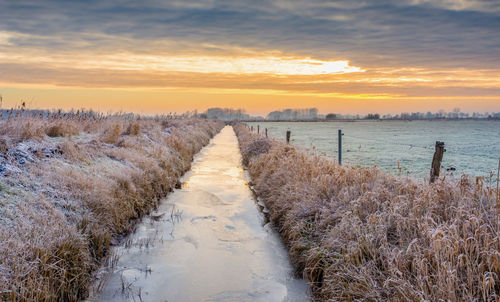Scenic view of sea against sky during sunset - ostfriesland 