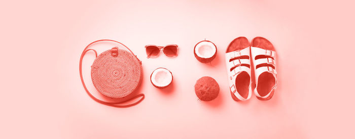 High angle view of eyeglasses on table against white background