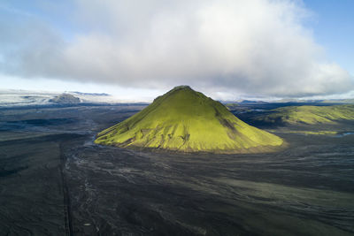 Scenic view of volcanic landscape against sky