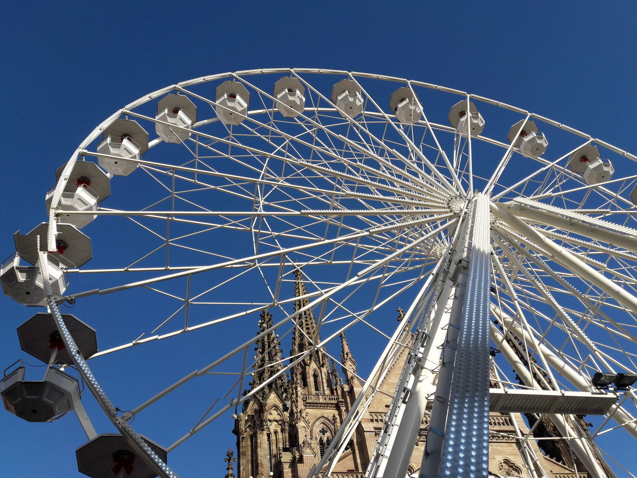 LOW ANGLE VIEW OF FERRIS WHEEL AGAINST SKY