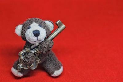 Close-up of toy against red background