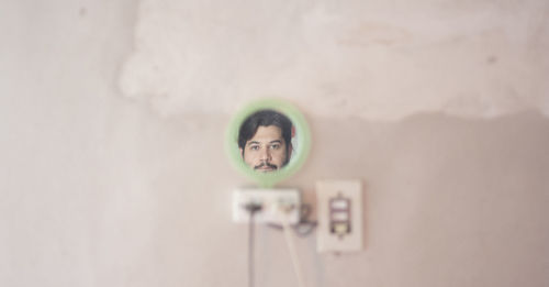 Portrait of man photographing