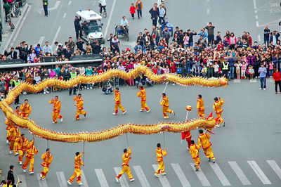 High angle view of chinese new year parade on street in city