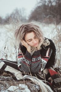 Close up dreaming woman outdoors in winter portrait picture