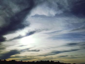 Low angle view of dramatic sky during sunset