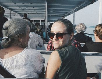 Portrait of people sitting in car