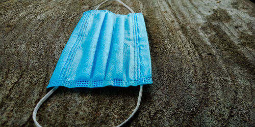 High angle view of clothes drying against blue background