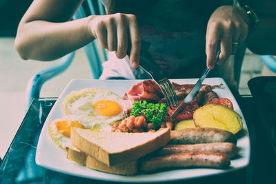 Close-up of man preparing food