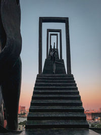 Statue of historic building against sky