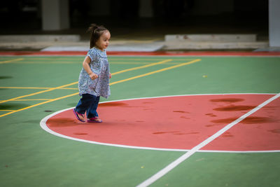 Girl playing with ball